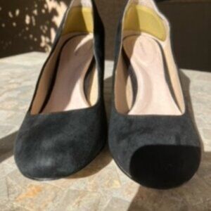Black suede pumps